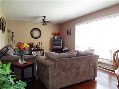 Tasteful living room with large windows to enjoy t