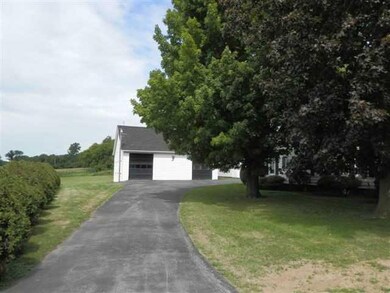 Facade/Exterior Front View of two car garage, blac