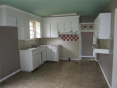 | Nice bright kitchen w/cute original cabinets! | Lots of space |