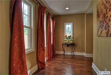 View of Foyer from Central Hall, Living Room to ri