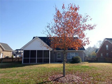 Rear View of Home, Screened Porch and Patio