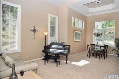 Inviting Entrance with Soaring Ceilings & Coffered