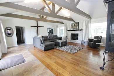 Enjoy a cozy evening by the fire in your 24x21 Great Room