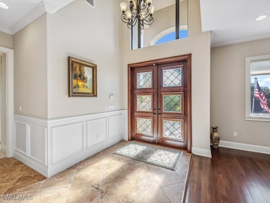 Entryway featuring hardwood / wood-style floors, c