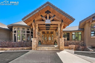 Covered front entry with exposed structural beams 
