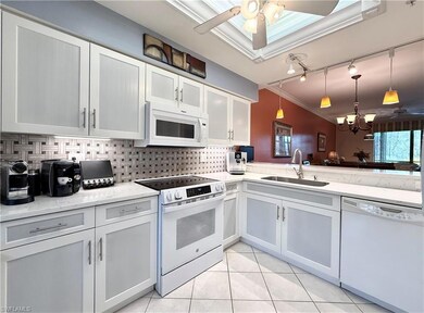 Updated Kitchen - quartz counter tops, custom tile