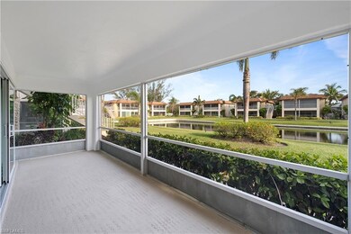 Unfurnished sunroom with a residential view and a water view