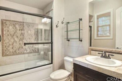 Main floor bedroom/office bathroom with custom sto