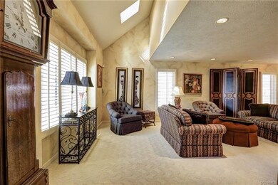 Living Room with Skylights and Recessed Lighting