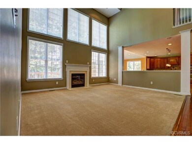 2-story great room with gas fireplace and surround
