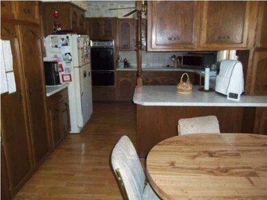 Kitchen/breakfast nook; large built-in pantry on l