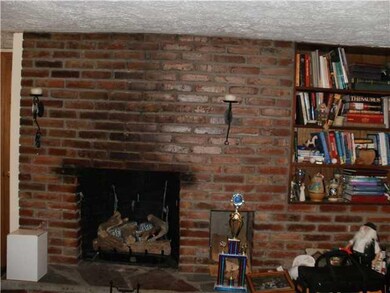 Other brick fireplace with gas insert