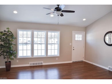 Beautiful living room with a vaulted ceiling and b