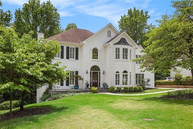 View of front of house with stucco siding, a front