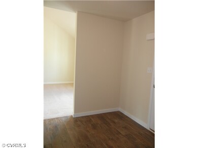 Foyer - Laminate wood flooring.