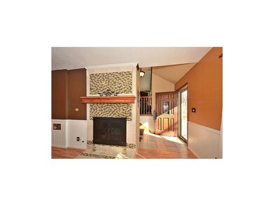 Fireplace has been remodeled with an energy effici