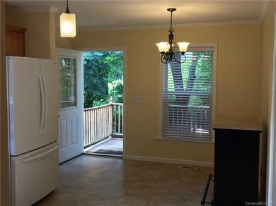Kitchen / dining area looking out onto back deck.
