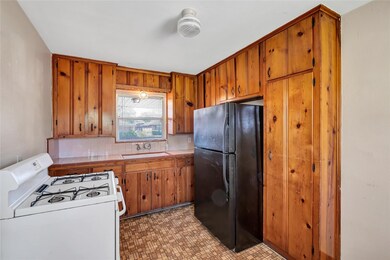 Perfectly placed window above the kitchen sink let