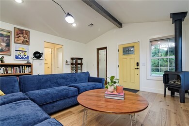 Cozy living room with ample lighting.