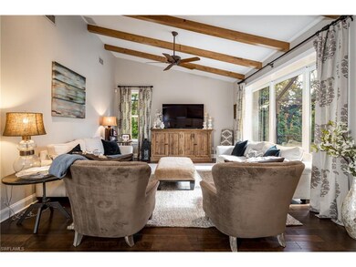 Family Room located off the kitchen with soaring c