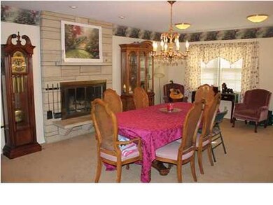 Formal/Hearth room with stone wood burning firepla