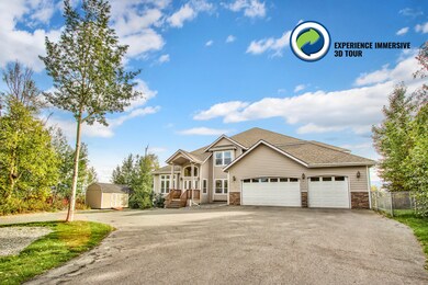 Garage side of home with fencing