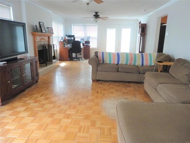 Spacious Living room with double door to side yard