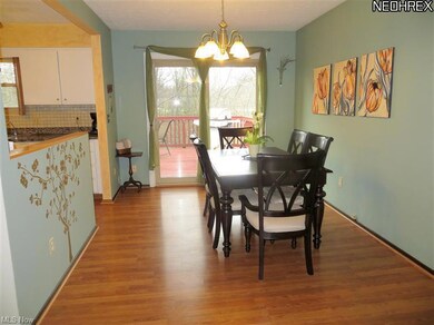 Formal Dining Rm w/Gleaming Laminated Wood Floors.