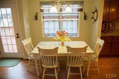 Sunny Breakfast Nook with door to back deck & leve