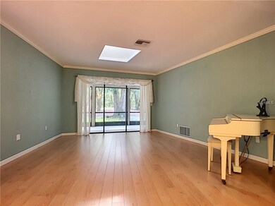 Formal living room with views of the woods