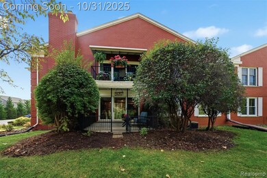 End unit features a private covered patio
