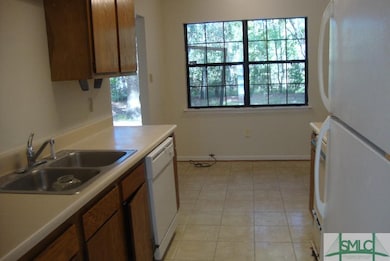 Kitchen with breakfast area overlooking the back y