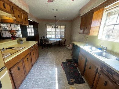 This home features a spacious kitchen that sits in