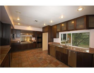 Kitchen. Granite counters, lots of cabinets.