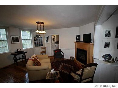 Family Room. With pine floors and gas fireplace, t