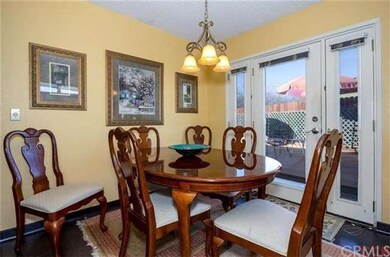 Three sets of sliders or french doors to the outsi