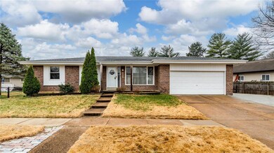 Three bedroom two and a half bath brick ranch home with finished lower level.
