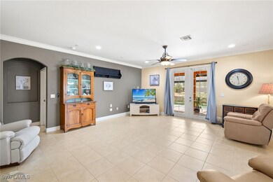 Living area featuring french doors, ornamental mol