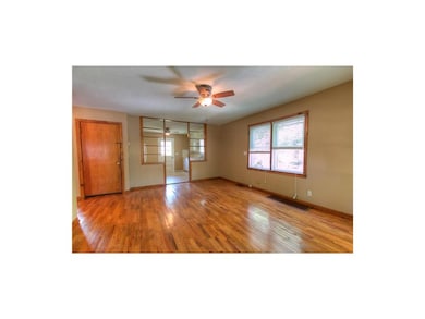 Entering into the living room.  All new blinds, ce