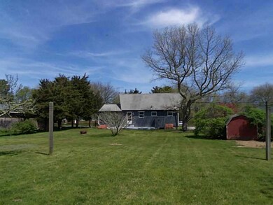 Exterior Back. Huge level back yard complete with
