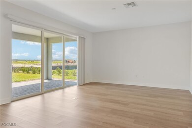 Empty room featuring light wood-type flooring and baseboards