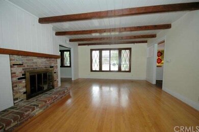 Living Room with Gas and Wood Burning Fireplace