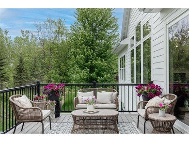 Charming deck area. Backyard faces trees for extra
