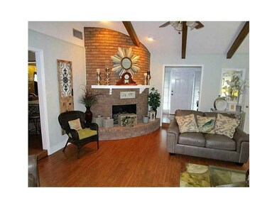 Fireplace. Corner gas log fireplace in living room