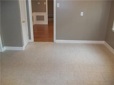 Eating area in kitchen with fresh paint & new cera