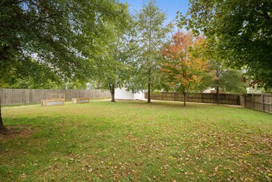 View of the backyard from the right side of the house. 