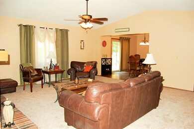 View of living room/dining room from the hall