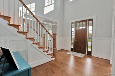Fantastic open foyer with 8 ft door complete with