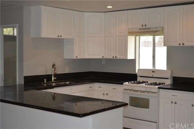 Sleek black granite counter tops. This family styl