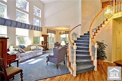 Living Room with 2 Story Windows